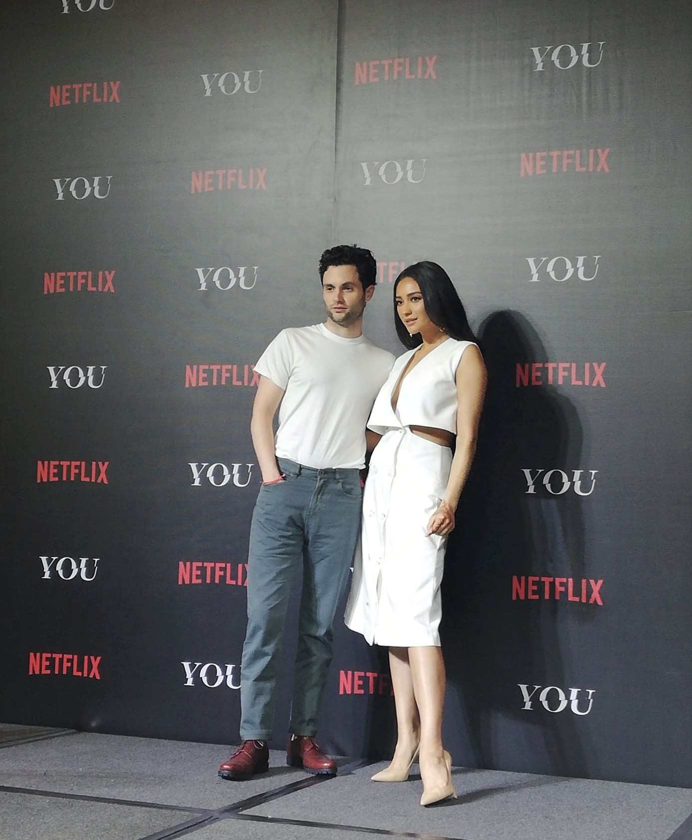 Penn Badgley and Shay Mitchell of Netflix Original series, "YOU" pose for photos after their exclusive sit-down panel, "In Conversation with YOU" at The Peninsula Manila on January 14, 2019